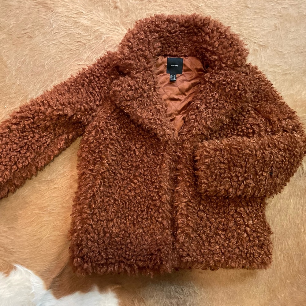 Brown teddy bear jacket.